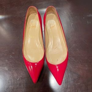 Christian Louboutin flats in patent red leather. Great condition